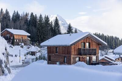 Chalet covered in snow at Alps Resorts Alpendorf Dachstein West