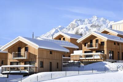 Detached chalets in the snow at Alps Resorts Bergeralm Chalets