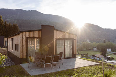 Chalet with terrace and garden furniture at Alps Resorts Chalets and Glamping Nassfeld