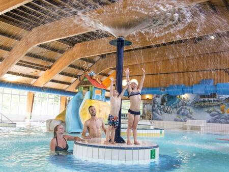 Splashing around in the indoor pool of holiday park Landal Miggelenberg