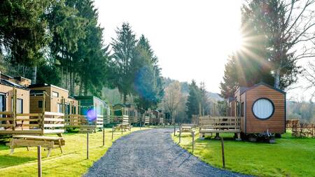 Tiny houses on a road at the Landal Nature Parc Saint Hubert holiday park