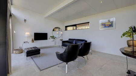 Living room of a holiday home at Landal Olde Kottink holiday park