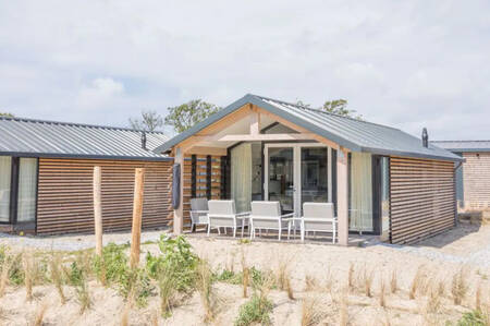 Holiday home with covered terrace at the Roompot Ameland holiday park
