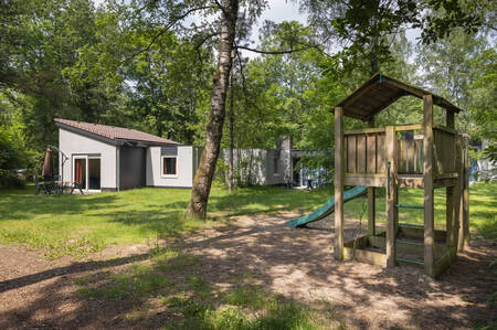 Small playground between holiday homes at Summio Holiday Park De Berkenhorst