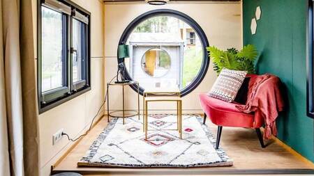 Living room of a tiny house at the Landal Nature Parc Saint Hubert holiday park